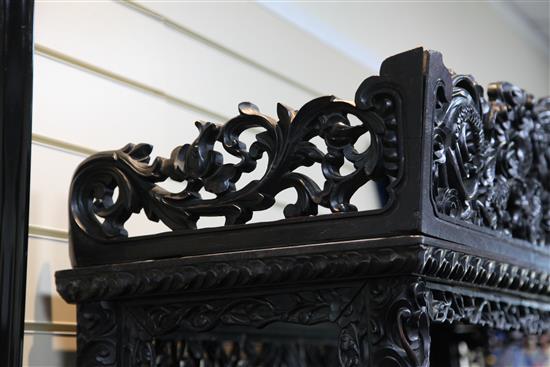 A Chinese black lacquered rosewood cabinet, late 19th century, W.3ft 9in. H.7ft D.1ft 5in.